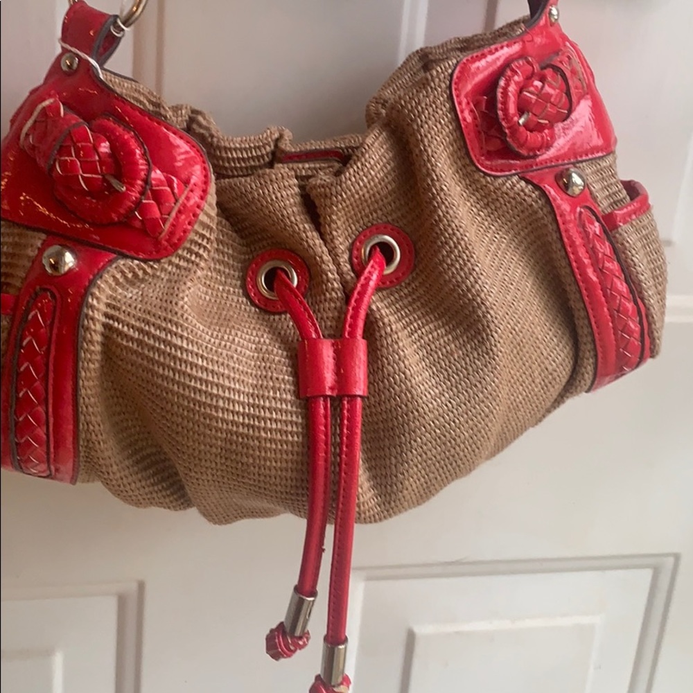 Kristin Davis pink and khaki purse